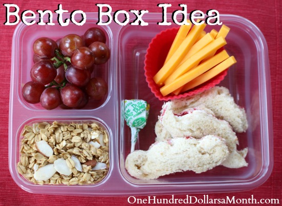 Bento Box Ideas – Peanut Butter and Jelly Sandwich, Grapes, Granola and Cheese Sticks