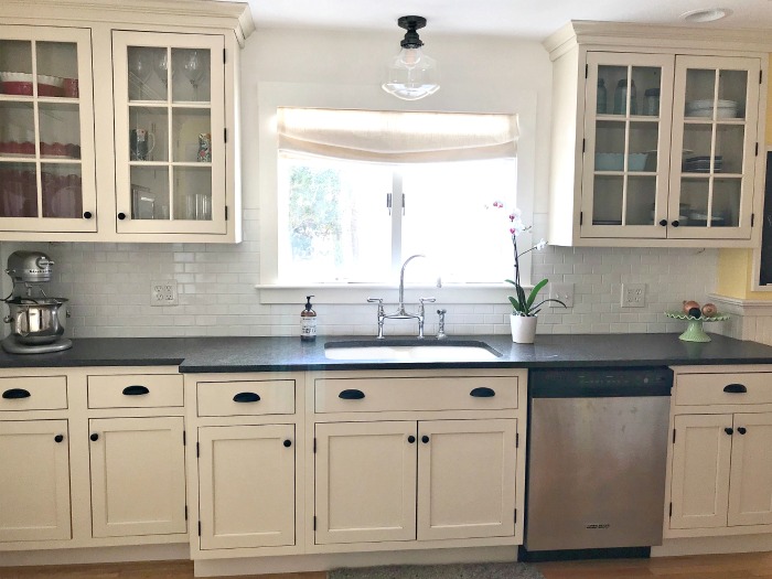 Cream Cabinets White Subway Tile Backsplash Black Countertops